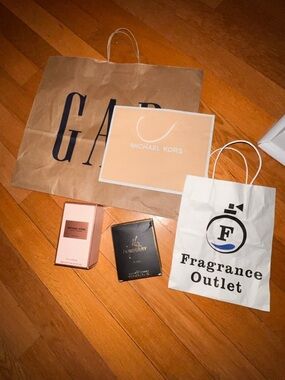 Designer store bags- 2 perfume boxes empty, will include 2 Michael kors bags.